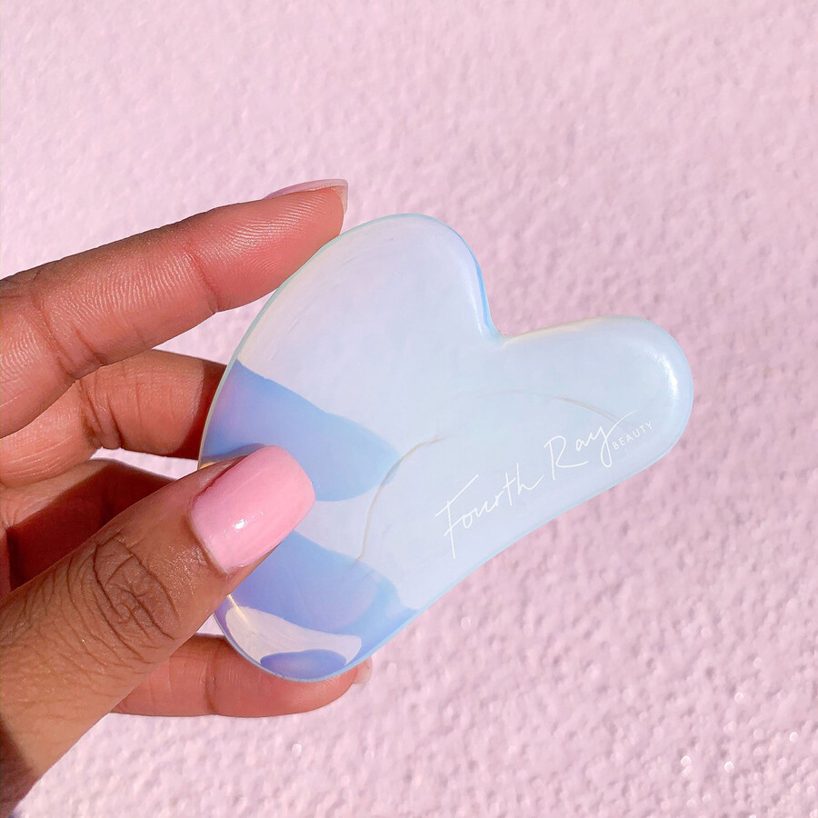 gua sha en cristal dopale