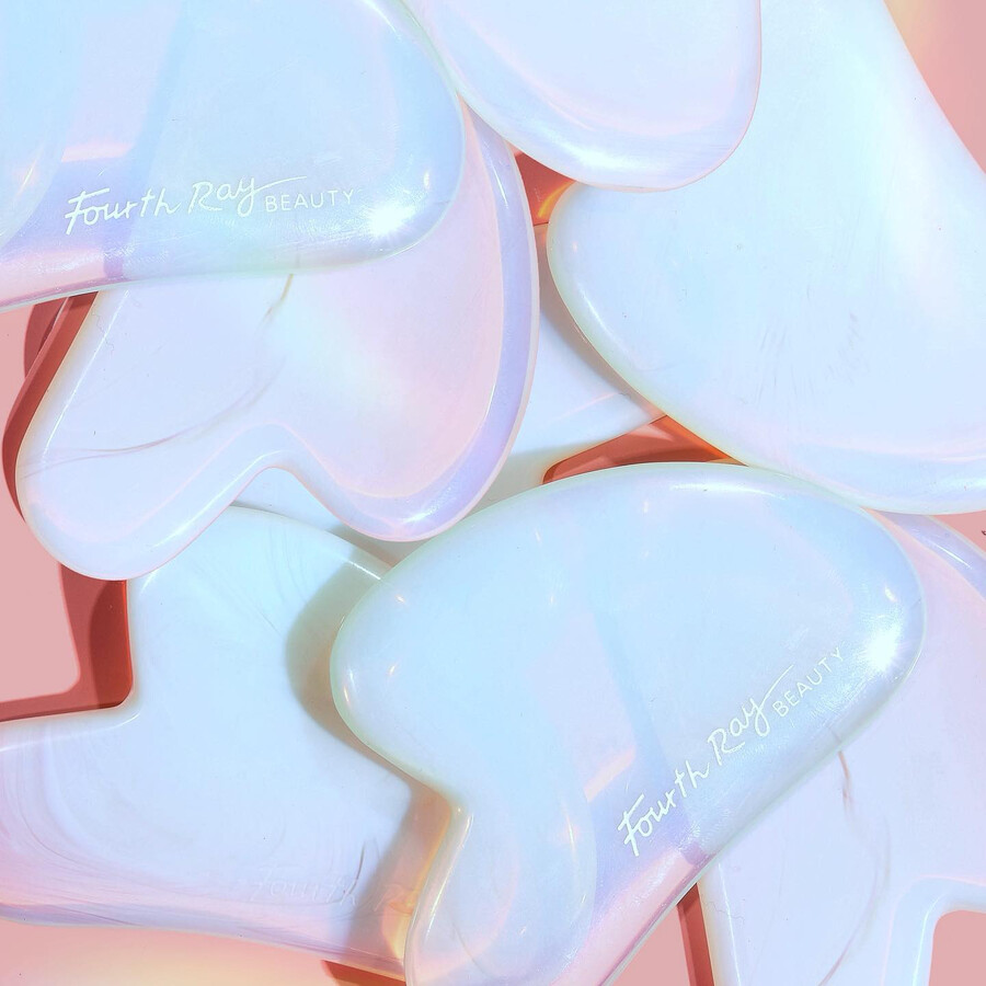 gua sha en cristal dopale